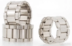 Repurposed stainless steel watch band rings, in a variety of styles and sizes