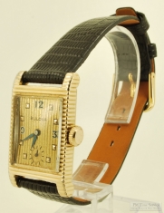 Bulova 21J grade 7AK 49 wrist watch, distinctive YGF rectangular case with a scalloped design