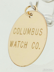 Round yellow gold filled (YGF) disk pocket watch chain fob engraved with "Columbus Watch Co."