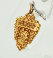 YBM triangular arrowhead-shaped 1966 R.C.J.H. wrestling award pocket watch chain fob