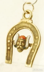 Unusual YGF horseshoe shaped fob