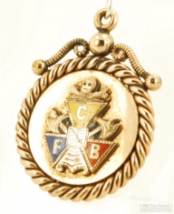 YGF & enamel round Knights of Pythias pocket watch chain fob, rope-design border