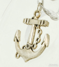 Elaborate WBM anchor-shaped pocket watch chain fob with pronged ends and chain detail