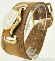 Manson 15J ladies' wrist watch, YBM & SS round case with white enamel bezel and gold filigree leaves