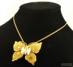 YBM butterfly pendant with a matching 16" YBM necklace, accented with small 5-petal flowers