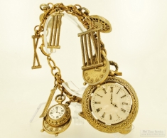 Vintage 8" heavy YBM charm bracelet with roman numerals, alarm clock, & pocket watch charms