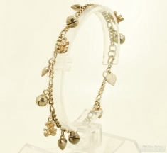 Vintage 7.5" silver figaro-link charm bracelet, small silver charms (teddy bears, hearts & spheres)