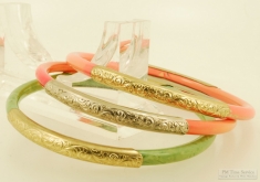 Vintage set of three 3" Lucite, YGF & WGF bangle cuff-style bracelets, coral pink and mottled green