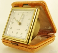 Florn (Germany) travel alarm clock, square YBM & brass case, square foldable travel cover